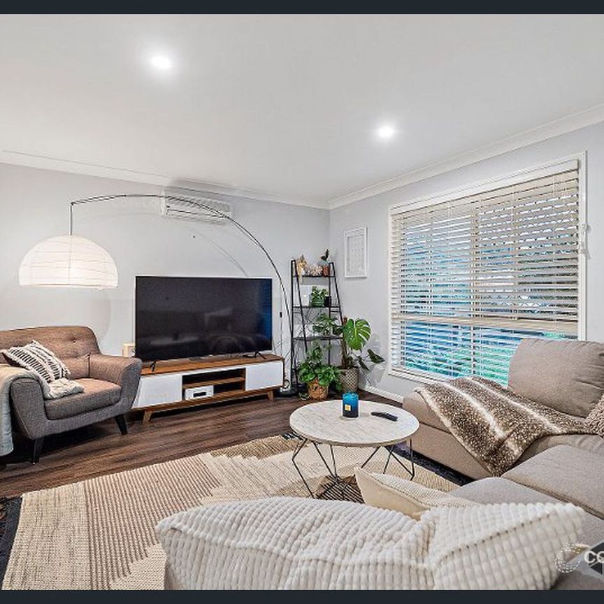 Spacious Family Home with Premium Features! - Photo 1