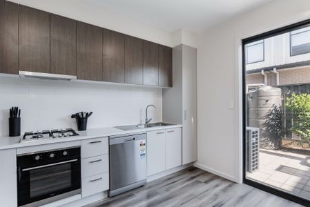 Stylish, Low-Maintenance Townhouse in Prime Location - Photo 2