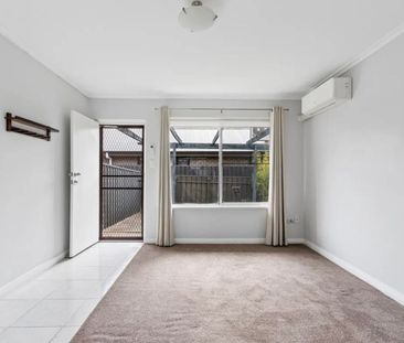 Well-Located 2-Bedroom Unit with Private Yard - Photo 4