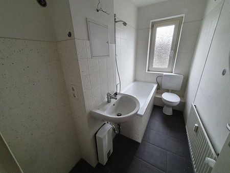 Schöne Single-Wohnung mit echten Holzdielen - zentral in Grevenbroich-Mitte - Photo 2