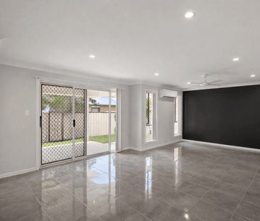 Stylish Family Home with Space & Comfort - Photo 2