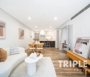 Stylish 2-Bedroom Apartment with Large Bedroom and Private Balcony - Photo 1