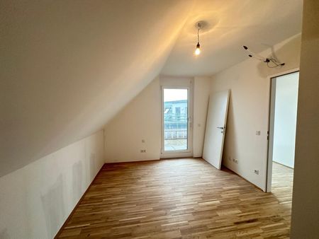 Modernes Wohnen in Brigittenau - 4-Zimmer-DG-Wohnung mit drei Freiflächen - Photo 4