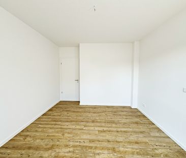 Exklusive Dachgeschosswohnung mit Wärmepumpe und PV-Anlage! - Foto 5