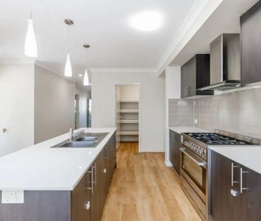 “Spacious Family Home in a Central Location!” - Photo 1