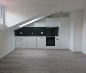 Gemütliche 2-Zimmer-Dachwohnung mit modernem Ausbau - im idyllische... - Foto 4