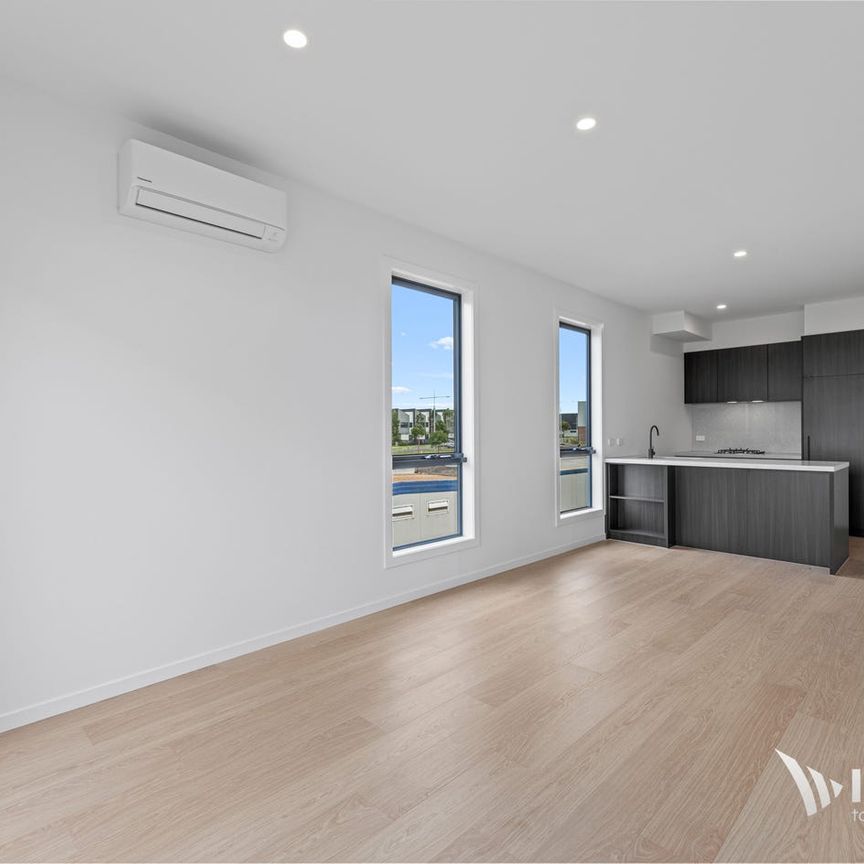 Upgrade Your Lifestyle in This Stunning Multi-Level Brand New Townhome! - Photo 1