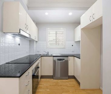 Stylish Two-Level Townhome in the Heart of Wilston Village - Photo 5