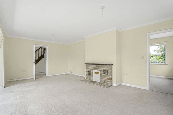 A four bedroom detached family home with driveway parking and gardens to the front and rear in Hopton. - Photo 1