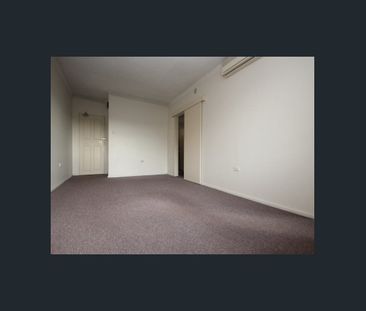 Well Presented Two Bedroom Apartment with Lock up Garage - Photo 5