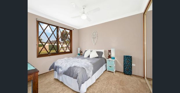 Charming Single-Story Brick Home with Spacious Backyard and Modern Interiors - Photo 1