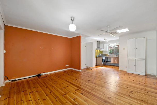 Low maintenance living in popular locale - Photo 1