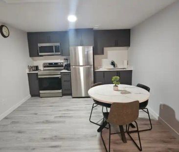 Modern 1-Bedroom Furnished Basement Suite – Utilities Included, Mov... - Photo 1