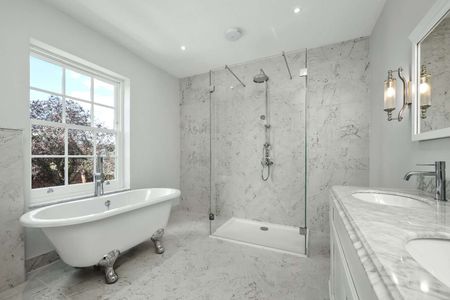 A stunning restoration of a four bedroom home, seamlessly blending modern living with original character and charm - Photo 5