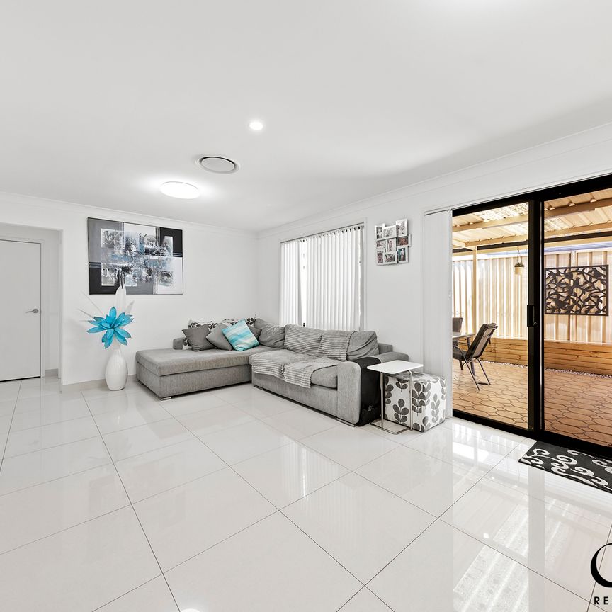 193 Braidwood Drive, Prestons NSW 2170 - House For Rent | Domain - Photo 1