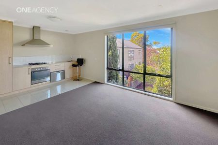Stylish, Spacious & Low Maintenance - Photo 2