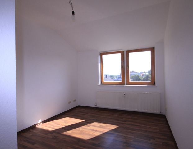 Tolle Dachgeschosswohnung mit großem Balkon - Foto 1