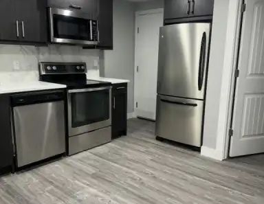 2 Bedroom + Den & 1 Bath -Legal Suite with Wifi Included | Cityside Green NE, Calgary - Photo 1