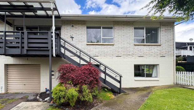 Spacious Four Bedroom Family Home in a Great Location - Photo 1