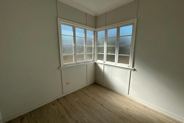 THIS BEAUTIFUL QUEENSLANDER IS AVAILABLE NOW - NEW FLOORING INSTALLED THROUGH OUT! - Photo 1