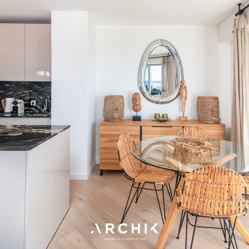 Architecture contemporaine, cet appartement de 60 m2 situé au premier étage d'une résidence standing installée au coeur d'un parc paysager, offre un accès direct à la plage du Moulleau. - Photo 1