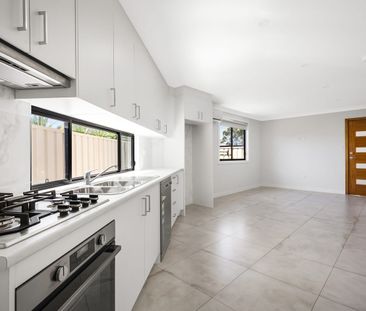 Step into comfort and modern living! - Photo 6