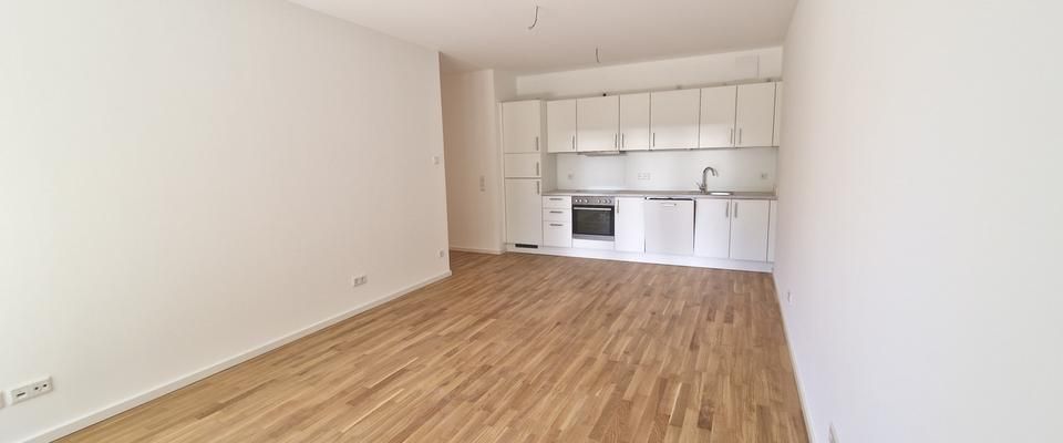 Stylische Neubauwohnung: 2 Zimmer, offener Wohnbereich & Balkon – Perfekt für Singles & Paare - Foto 1