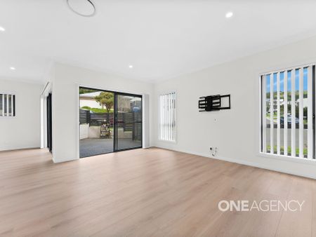 MODERN THREE-BEDROOM HOME WITH QUALITY INTERIORS - Photo 3