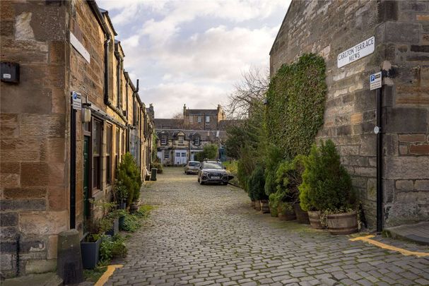 A fully refurnished and immaculately presented two bedroom mews house located on Carlton Terrace Mews. - Photo 1