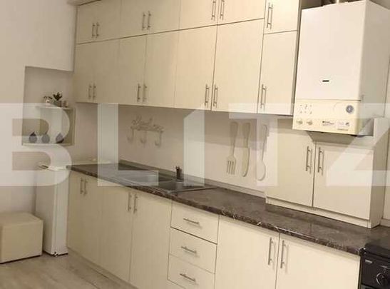 Apartament cu 1 camera, 30 mp, imobil tip casa, mobilat modern, acces gradina - Photo 1