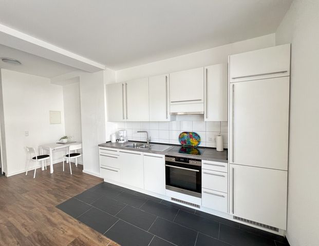 Möbliertes Apartment mit Terrasse in zentraler Lage von Ippendorf! - Photo 1