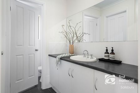 Spacious Family Home with Massive Electricity Savings! - Photo 3