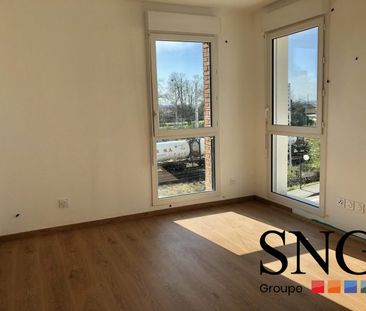 T2 AVEC LOGGIA ET UN PARKING INTERIEUR - Photo 2