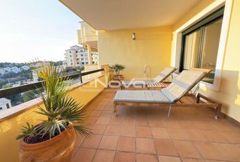 Noble luxury. Two bedroom apartment in a quiet urbanization overlooking the sea and golf cour