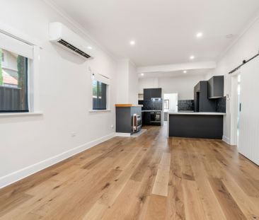 COTTAGE CHARM MEETS MODERN COMFORT - Photo 5