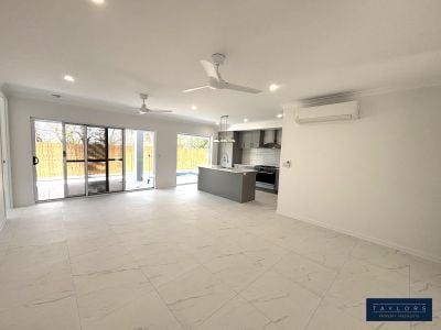 Brand New Luxury Home with Pool in Cannonvale! - Photo 1