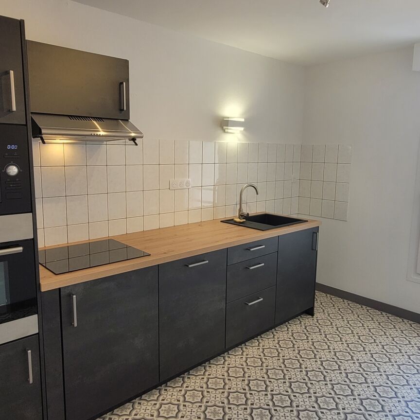 Location Appartement 2 pièces 59m² REMIREMONT 88200 - Photo 1