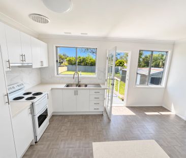 FRESHLY RENOVATED THREE BEDROOM HOME - Photo 6