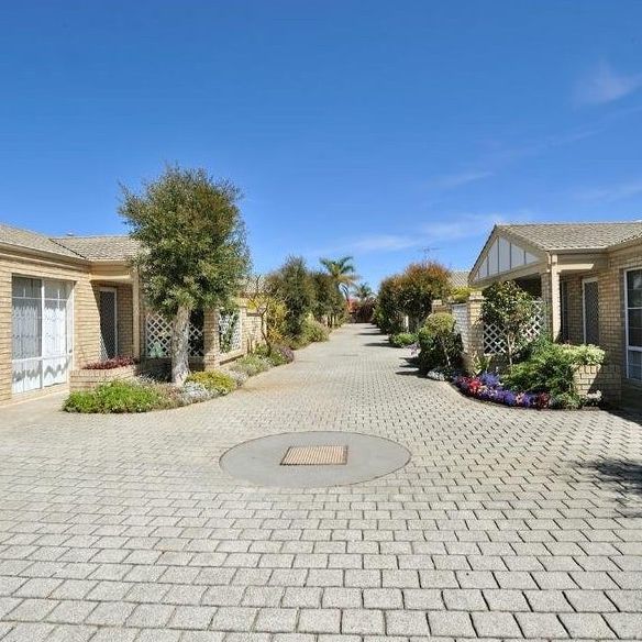 Modern Easy-Care Living Minutes from Rockingham Beach - Photo 2