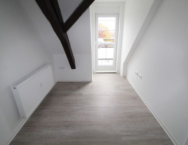 Perfekt für Singles - kleine DG-Wohnung mit Balkon und Fassadenvollwärmeschutz - Photo 1