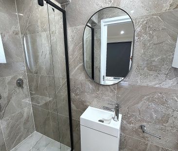 Fully Renovated Home in Prime Seaford Location - Photo 6