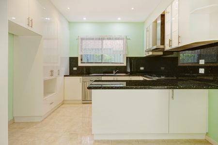 Spacious Double-Storey Townhouse with Modern Comforts - Photo 3