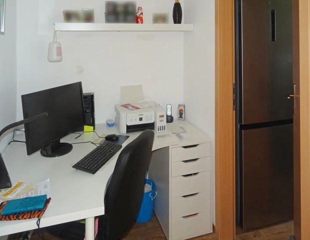 Großzügige Dachgeschosswohnung mit Balkon und schöner Aussicht! - Foto 1