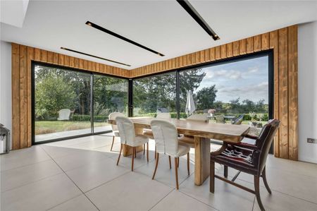 An impressive contemporary abode tucked away in a private elevated position with unrivalled country views. - Photo 4