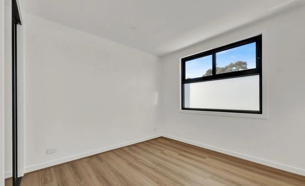 Brand New - Modern Two-Bedroom Townhouse in Prime Reservoir Location - Photo 1
