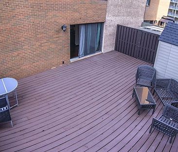 Corner unit with a HUGE patio | 207 - 718 12 Ave SW, Calgary - Photo 1