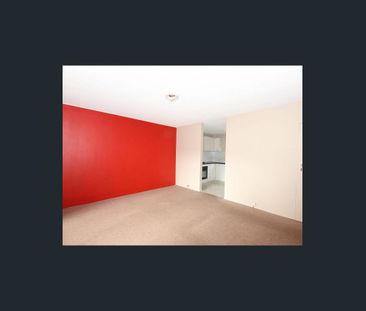 Modern Comfort & Location 2-Bedroom Brick Unit in the Heart of Mans... - Photo 1