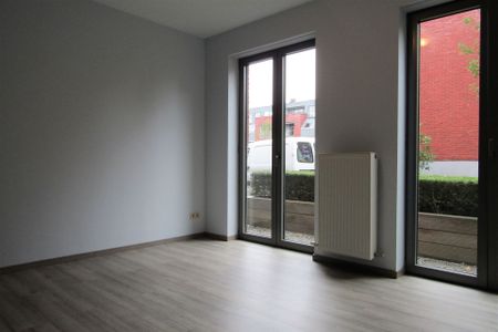 Gelijkvloers appartement met 2 slaapkamers en ruime tuin - Foto 3