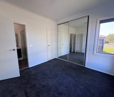 Freshened Up 4 Bedroom Home in Chisholm - Photo 3