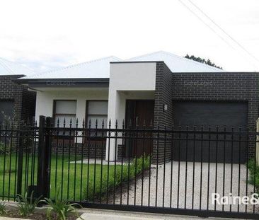 Spacious & Modern Family Living in Prime Eastern Suburbs Location - Photo 3